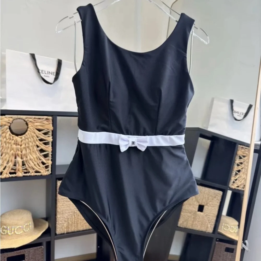 Sleek Black One-Piece Swimsuit with White Bow Belt - Picture 2 of 6